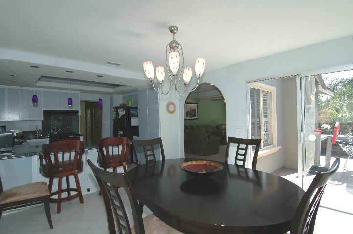 Kitchen Dining area with sliding door access to the Patio