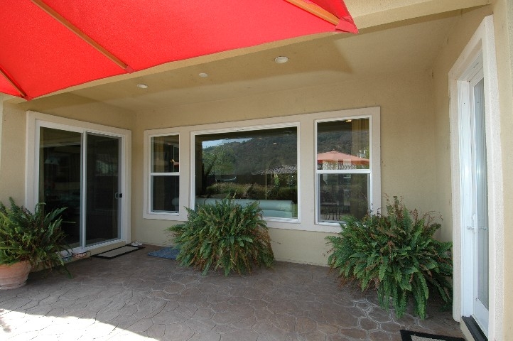 Stamped Concrete Covered Patio with Great Room and Master Wing Access