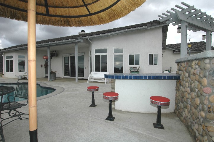 Antique Diner Bar Stools... with beautiful stone and tile work... wet Bar