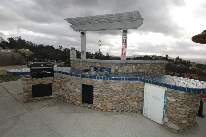 BBQ... Refrigerator... Storage... and plumbed to the homes Propane System...