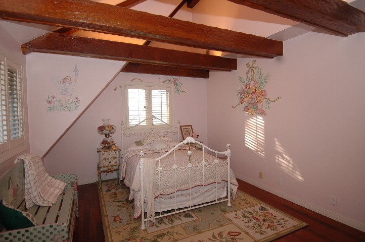 Spacious... and beautiful Guest rooms... with Plantation Shutters... and wonderful ceiling lines