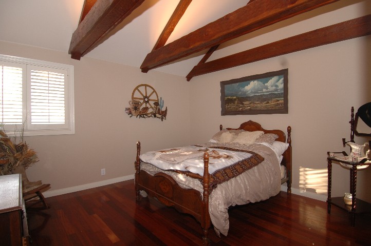 Brazillian Cherry Hardwood floors throughout... and many many hand painted murals...