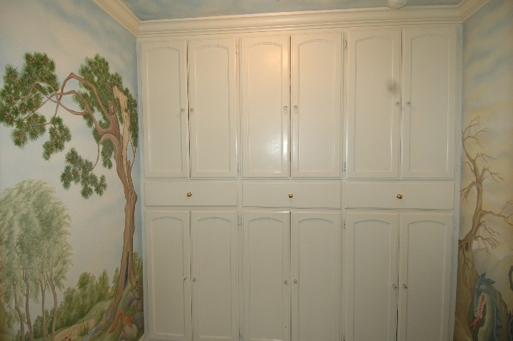 Originally the Laundry... now the Game/Storage room with Hand Painted French Trompe L'Oeil Murals