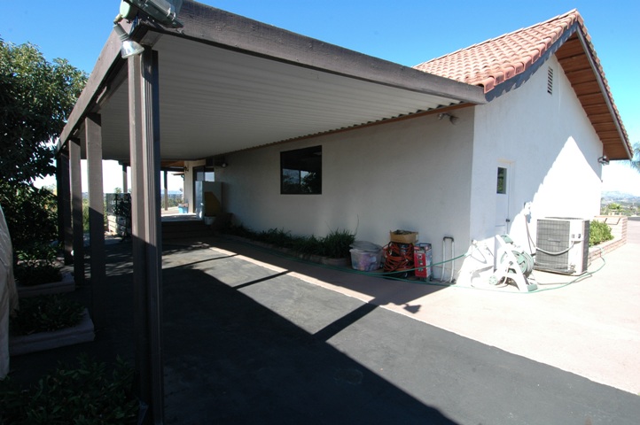 Oversized 3 Car Garage... + Carport... + RV Parking